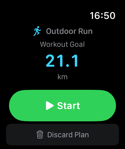 Apple Watch with a synced plan ready: Outdoor Run, workout goal 21.1 km, Start button